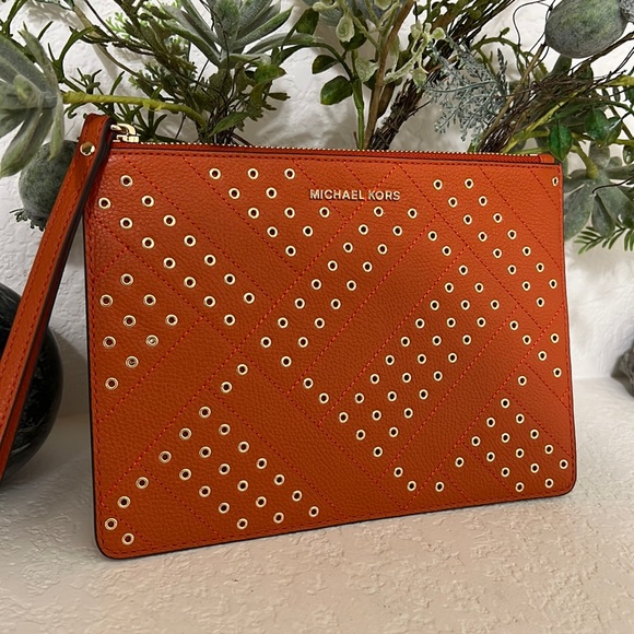 Michael Kors Handbags - Michael Kors Jet Set Travel Zip Clutch Persimmon Orange